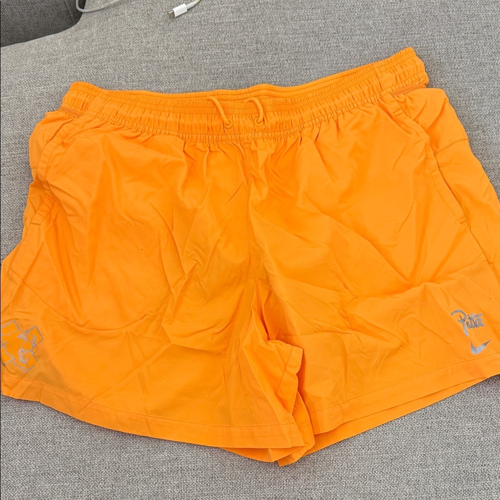 Nike Women's Bright Orange Athletic Shorts with Drawstring